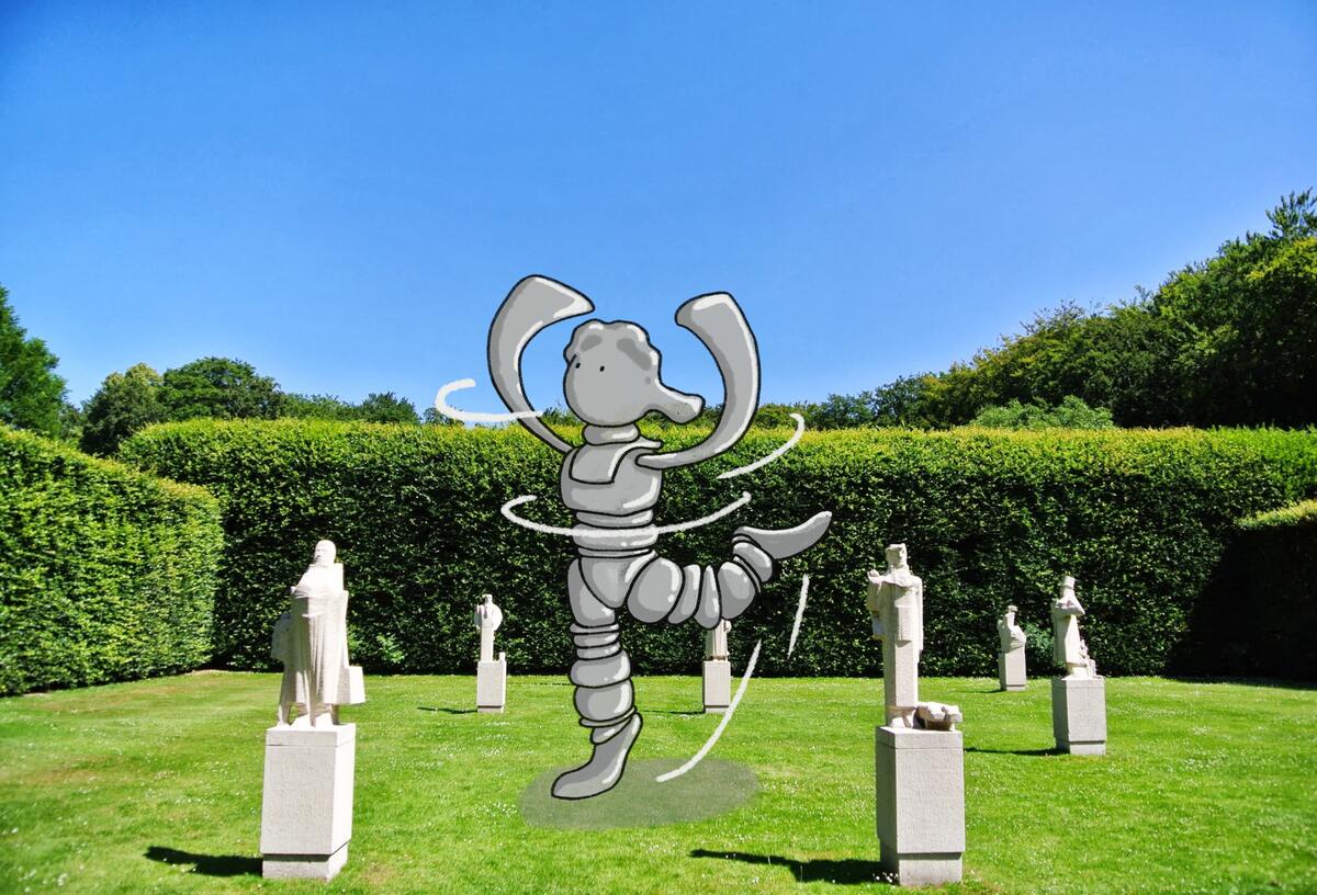 Es gibt mehrere Statuen im gr&uuml;nen Gras. Der Himmel ist blau. Eine gezeichnete Version von Mikkel tanzt zwischen den Statuen auf dem Bild.